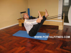 Balancín a Piernas Extendidas. Posición 2. Curso de Pilates Mat