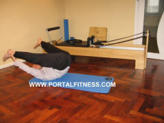 Balancín a Piernas Extendidas. Posición 4. Curso de Pilates Mat